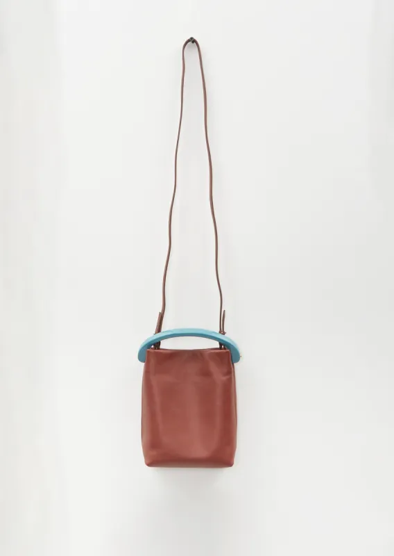 Crisp Leather Bag — Rust sold by La Garconne