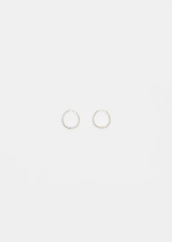 Medium Intrinsic Hoops sold by La Garconne