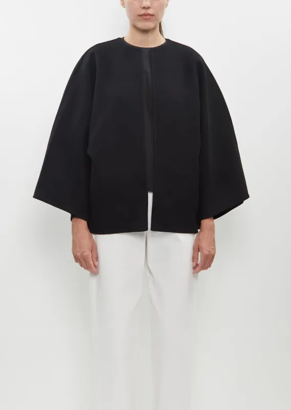 Neeru Double Face Cape sold by La Garconne
