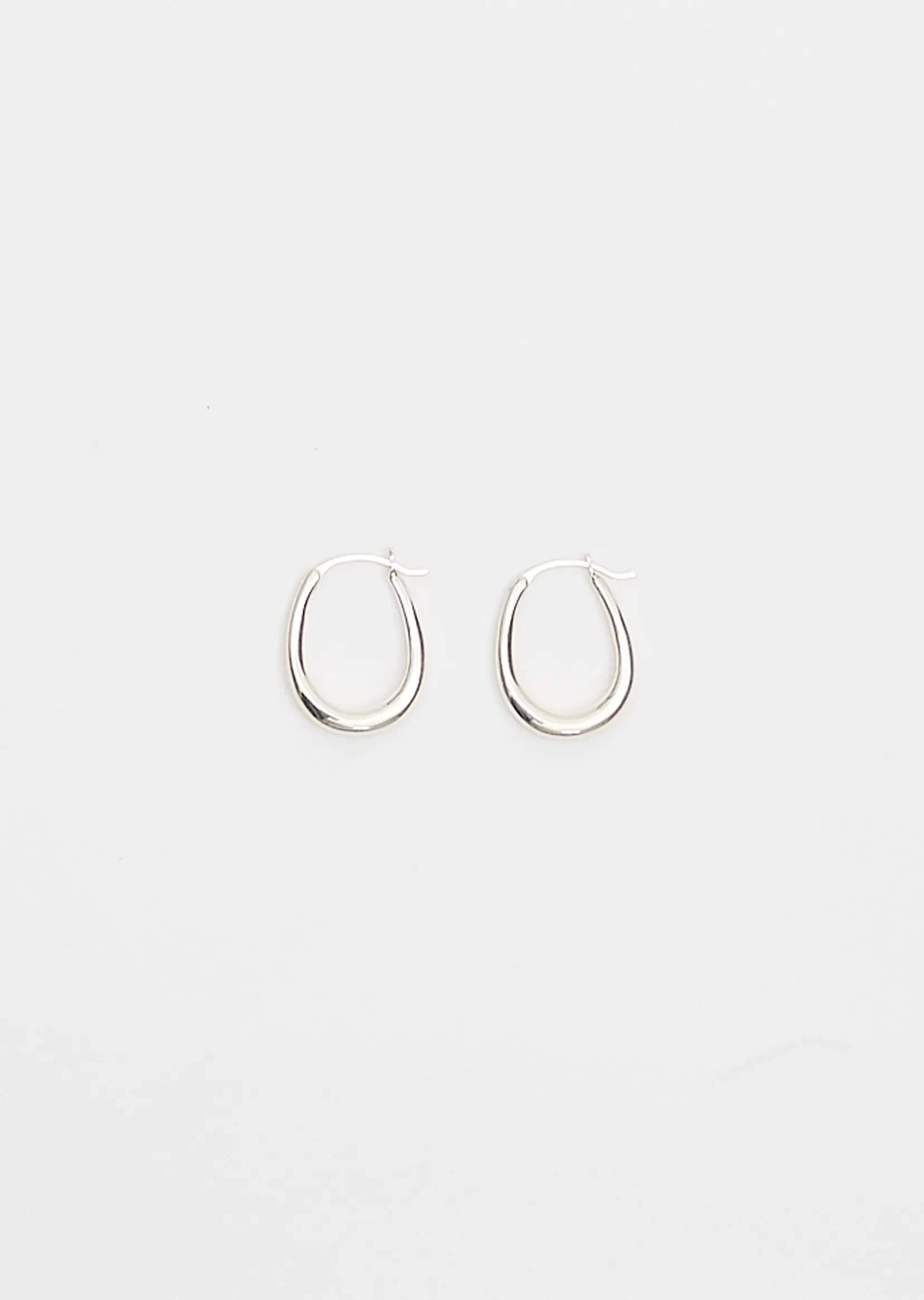Tiny Egg Hoops sold by La Garconne