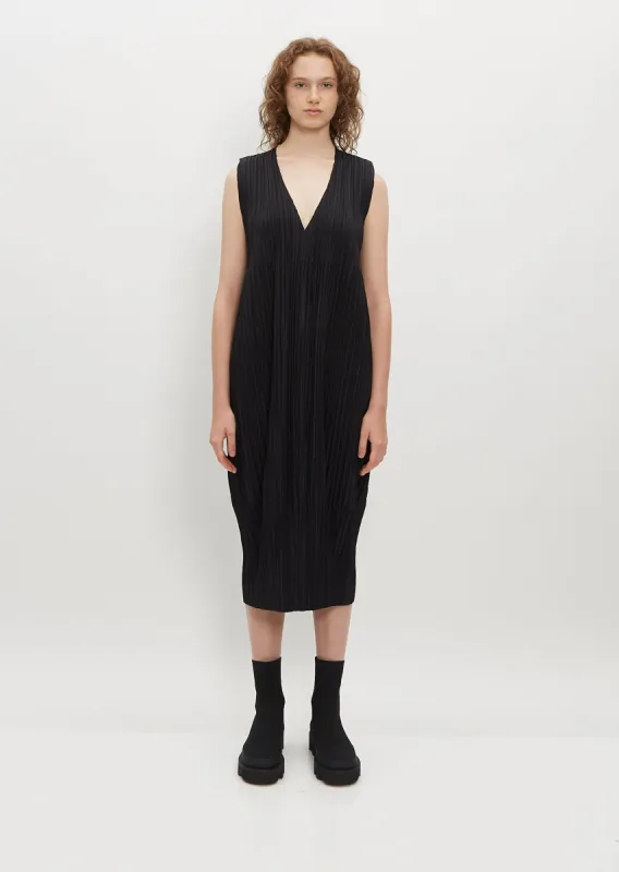 Pleated Fitted Hem Dress sold by La Garconne