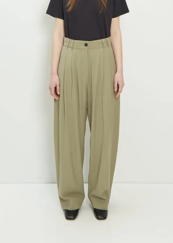 Nika Double Pleat Volume Wool Blend Pant sold by La Garconne
