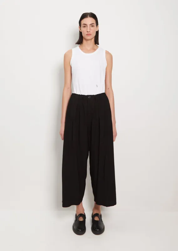 Wide Tuck Trousers sold by La Garconne