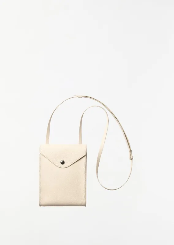 Envelope with Strap — Light Cream sold by La Garconne