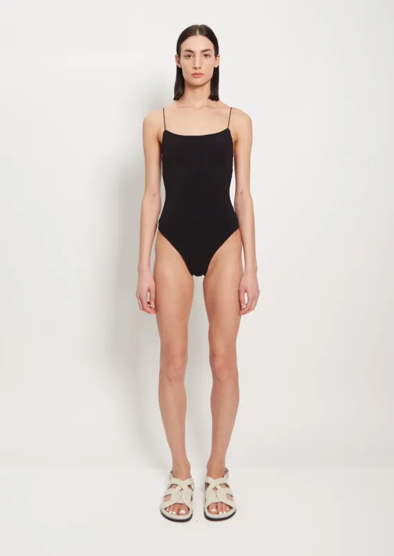 Smocked Swimsuit — Black sold by La Garconne