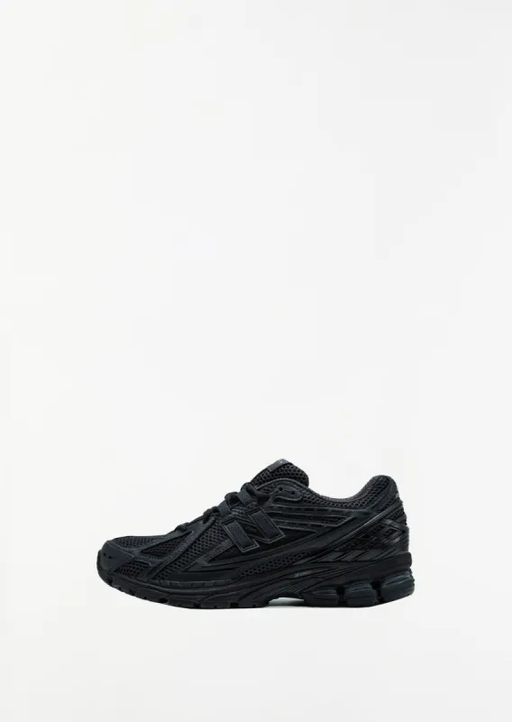 New Balance 1906 — Black/Black sold by La Garconne