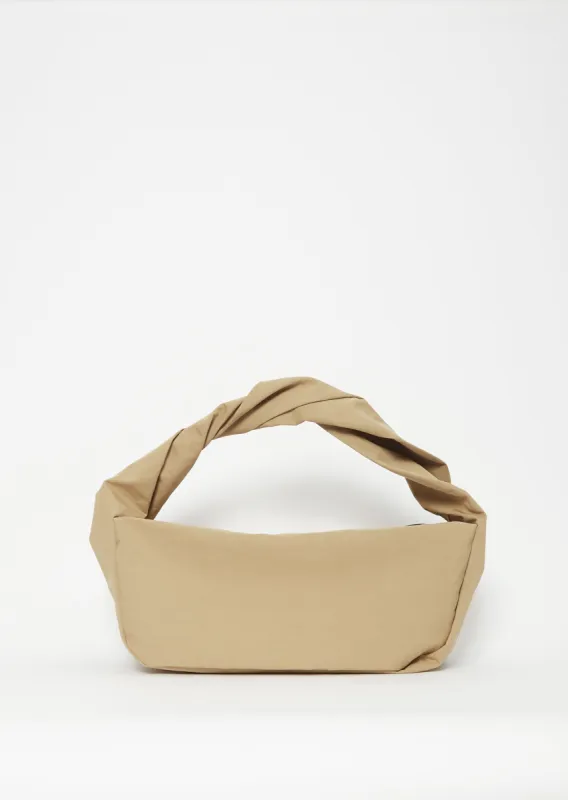 Twisted Shoulder Bag sold by La Garconne