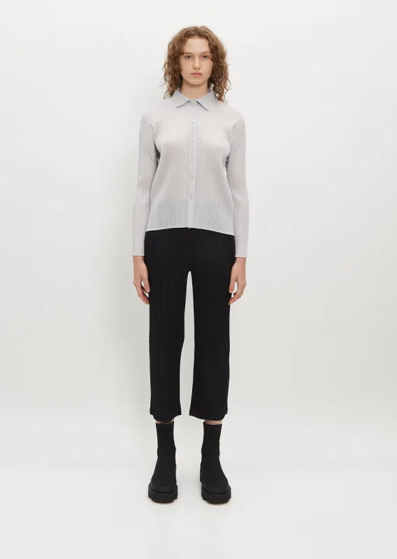 Pleated Crop Pants — Black sold by La Garconne