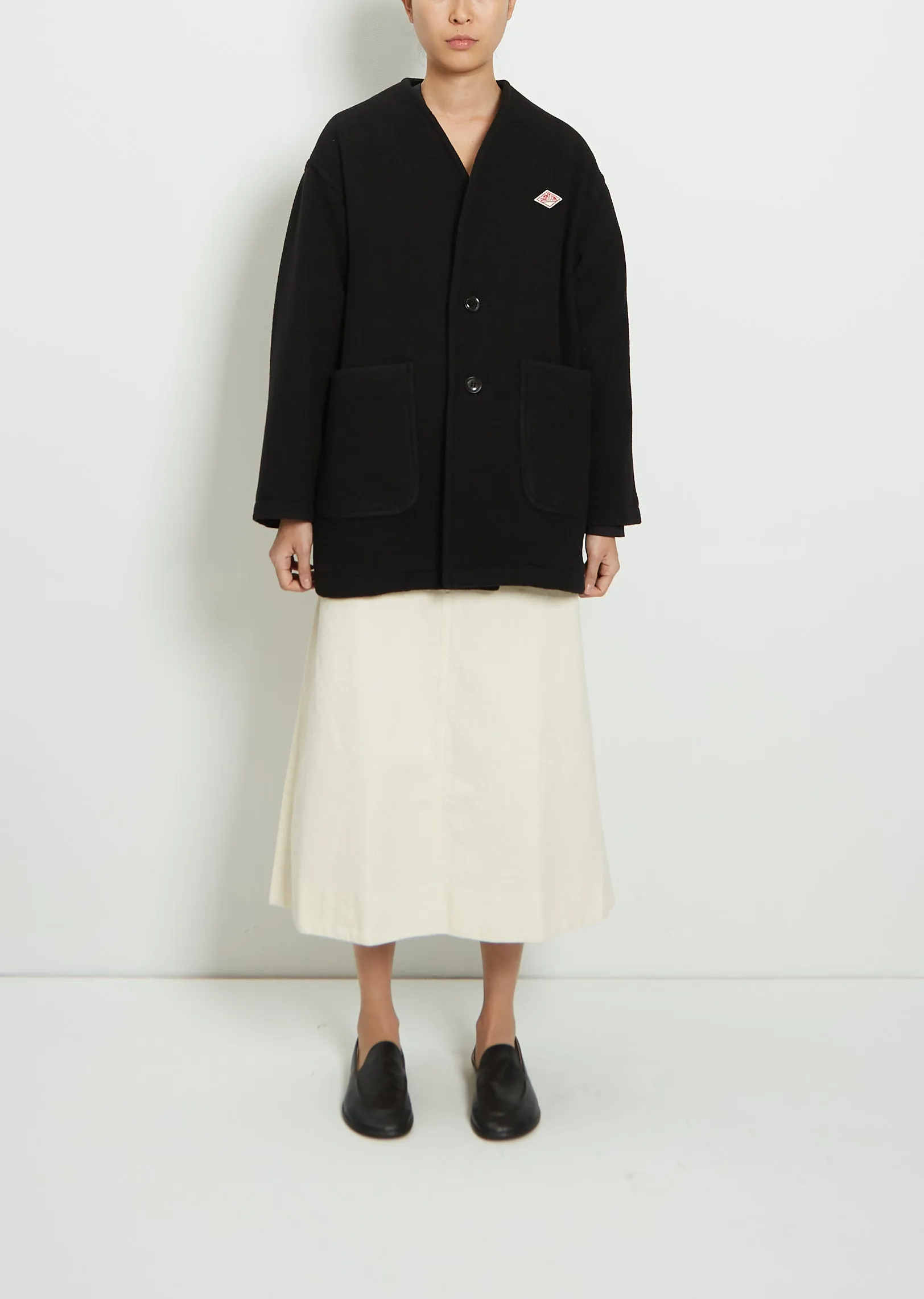Wool Blend Collarless V-Neck Coat sold by La Garconne