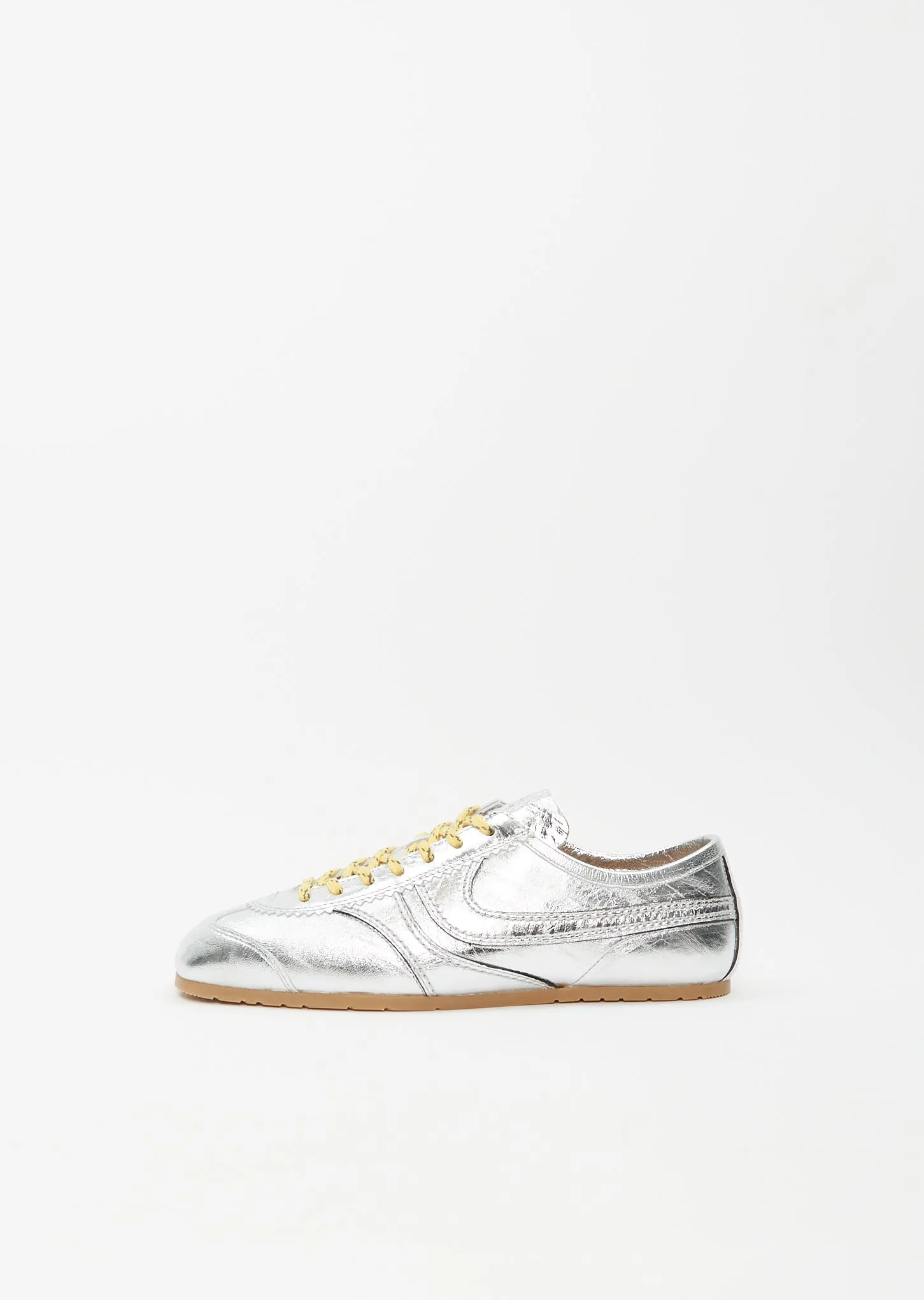 Leather Trainer — Silver sold by La Garconne