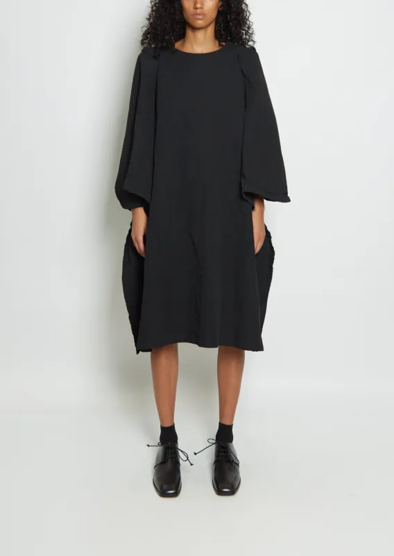 Rounded Sleeve & Skirt Dress sold by La Garconne