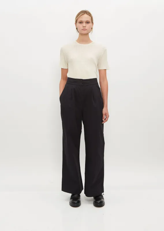 Pleated Wide Leg Trouser — Black sold by La Garconne