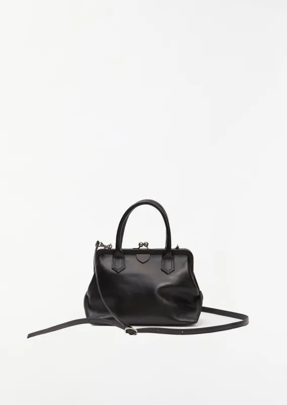 Clasp Closure Bag sold by La Garconne