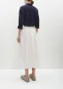 Tucked Long Skirt — Ivory sold by La Garconne