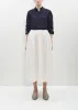 Tucked Long Skirt — Ivory sold by La Garconne