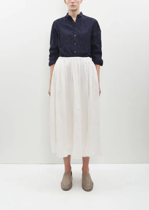 Tucked Long Skirt — Ivory sold by La Garconne