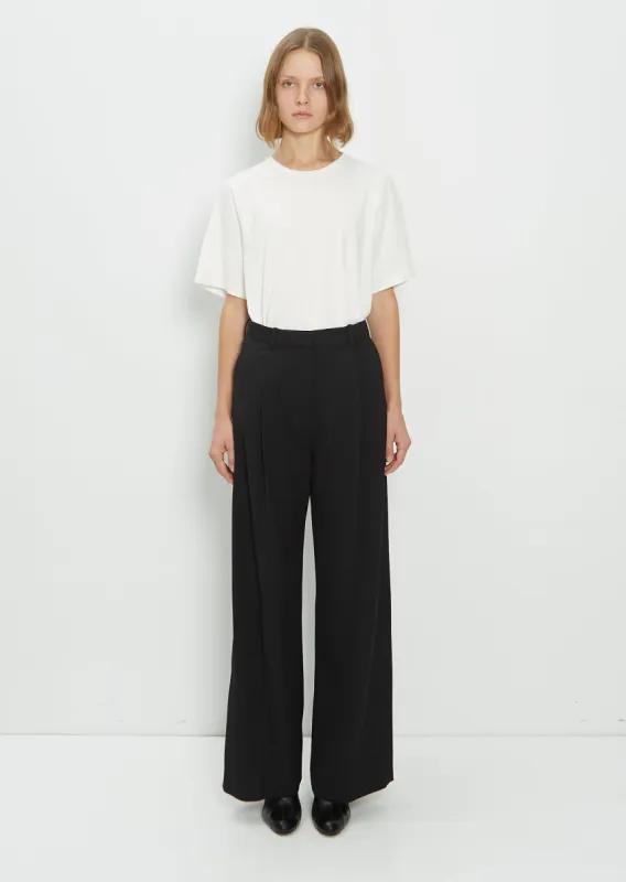 Deep Pleat Straight Trousers sold by La Garconne