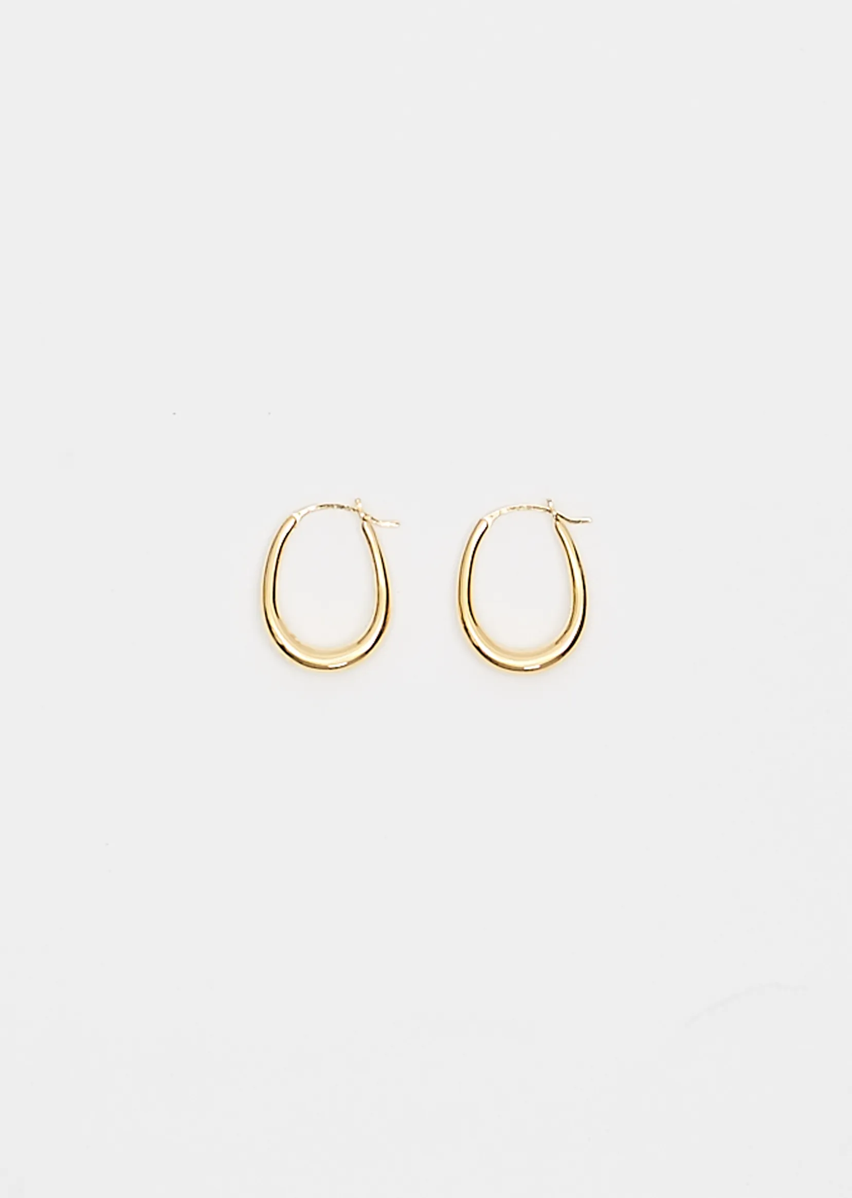 Gold Tiny Egg Hoops sold by La Garconne