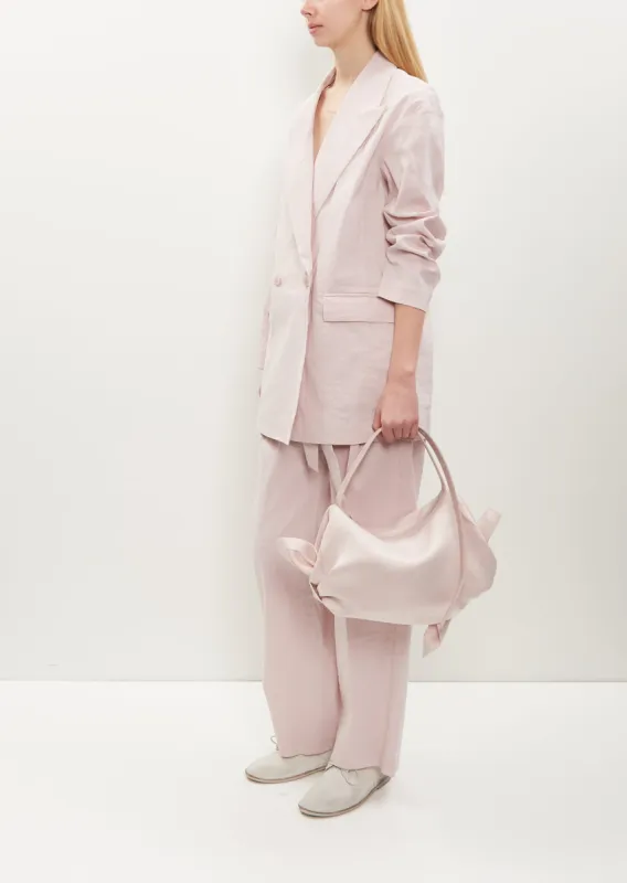 Enveloping Square Bag — Light Pink sold by La Garconne