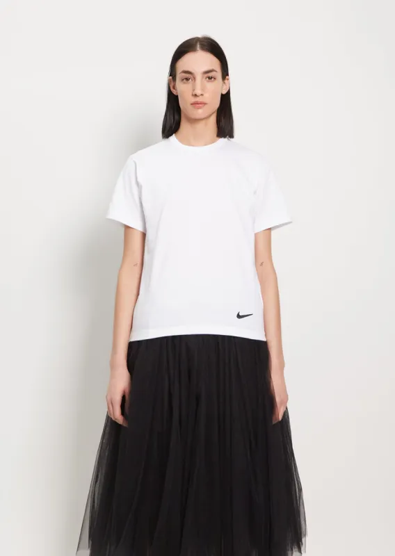 Nike Hem Logo T-Shirt — White sold by La Garconne