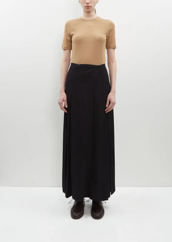 Pleated Wrap Skirt sold by La Garconne