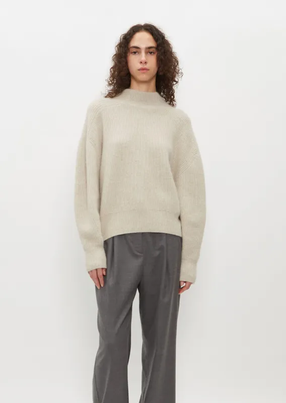 Safa Sweater sold by La Garconne