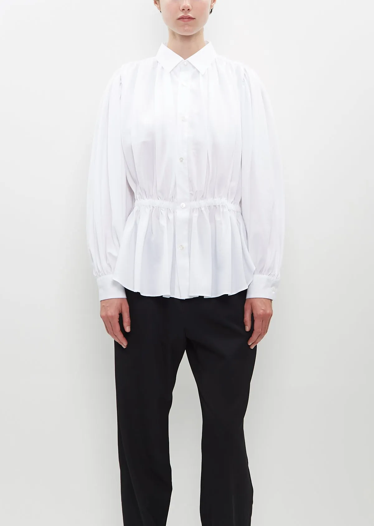Pleated Button Blouse sold by La Garconne