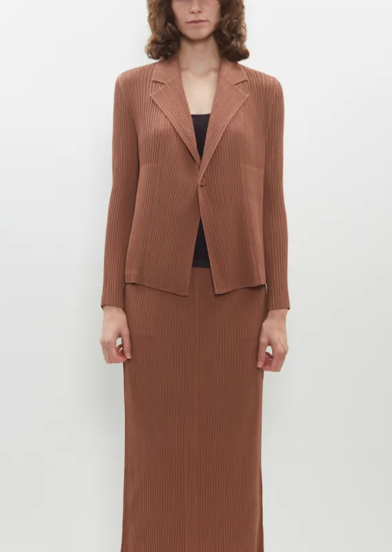 Hatching Pleats Jacket sold by La Garconne