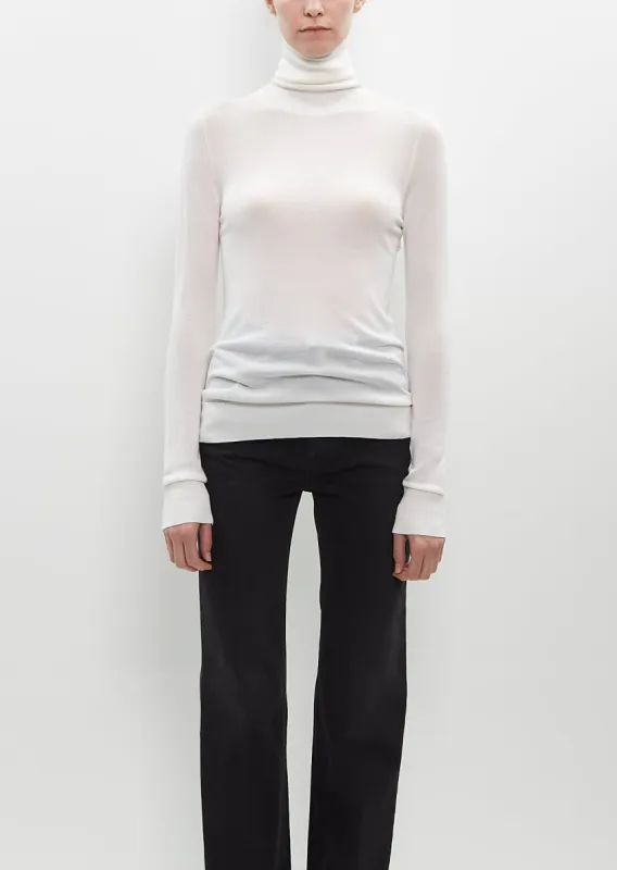 Fine Turtleneck sold by La Garconne