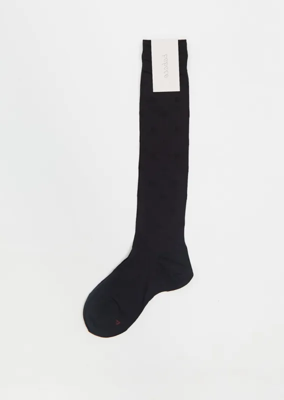 Sheer Dot Stocking sold by La Garconne