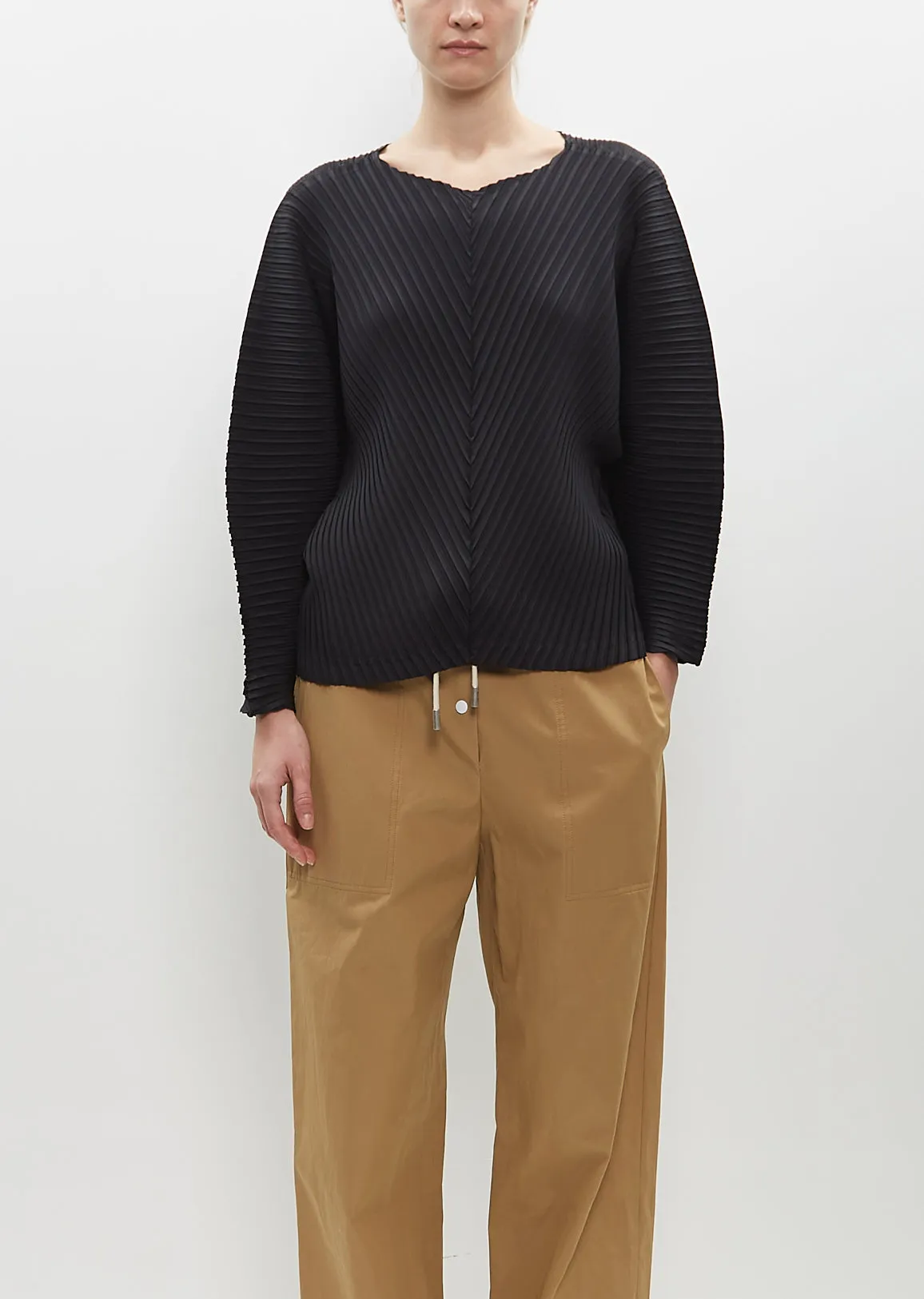 Vigor Pleats Solid Shirt sold by La Garconne