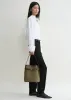 Belted Bucket Bag sold by La Garconne
