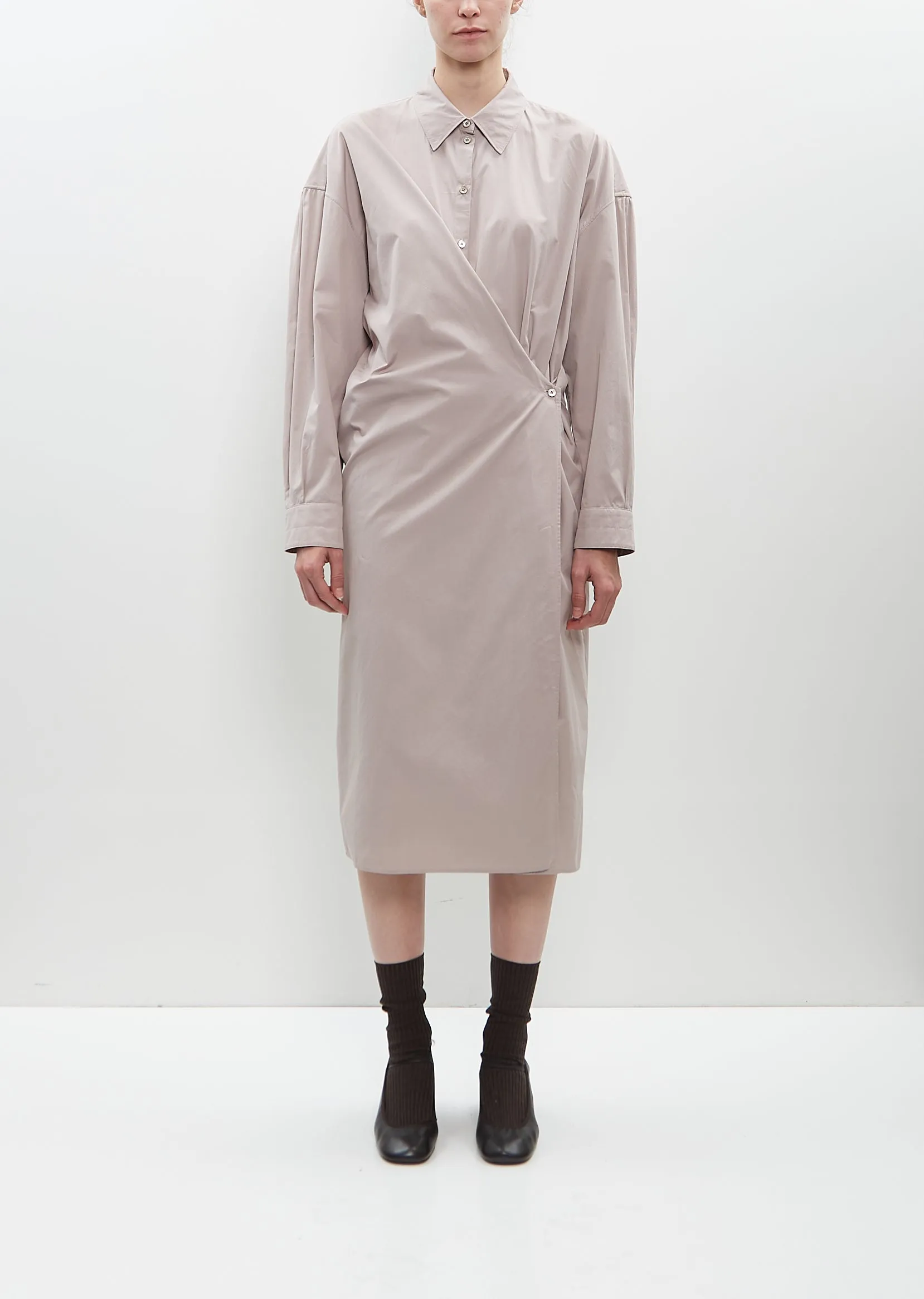 Straight Collar Twisted Dress sold by La Garconne