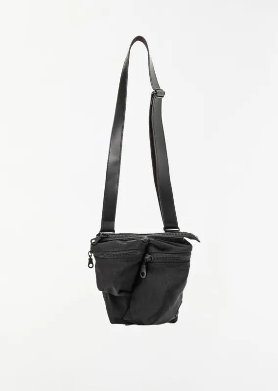 Irregular Mini Pochette — Black sold by La Garconne