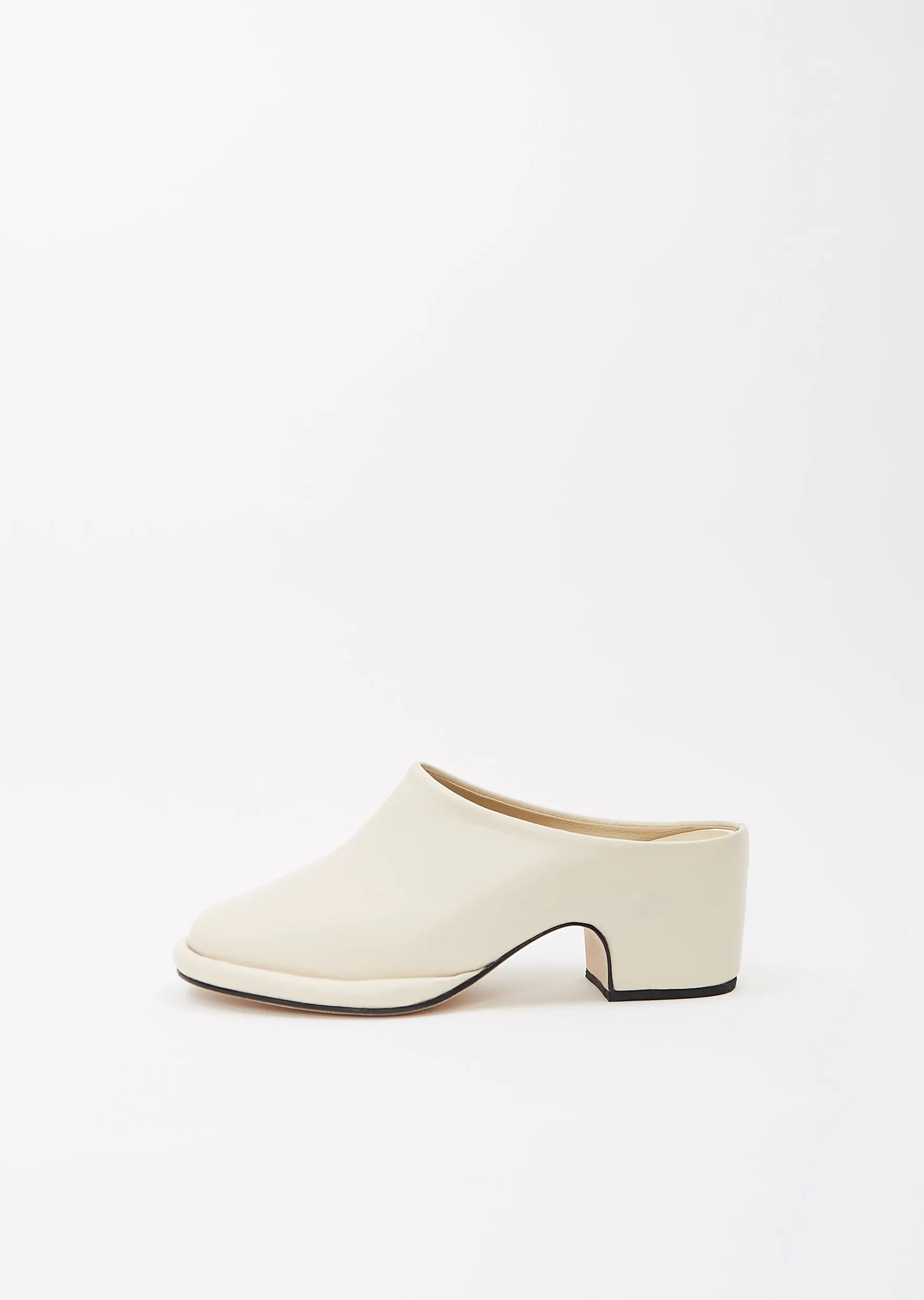 Leather Arch Mule — Ivory sold by La Garconne