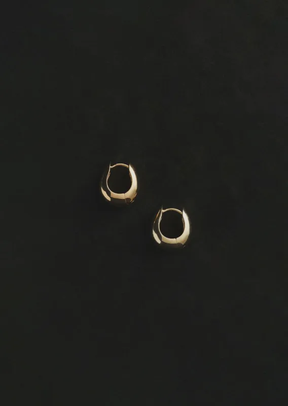 Gold Hinged Hoops sold by La Garconne