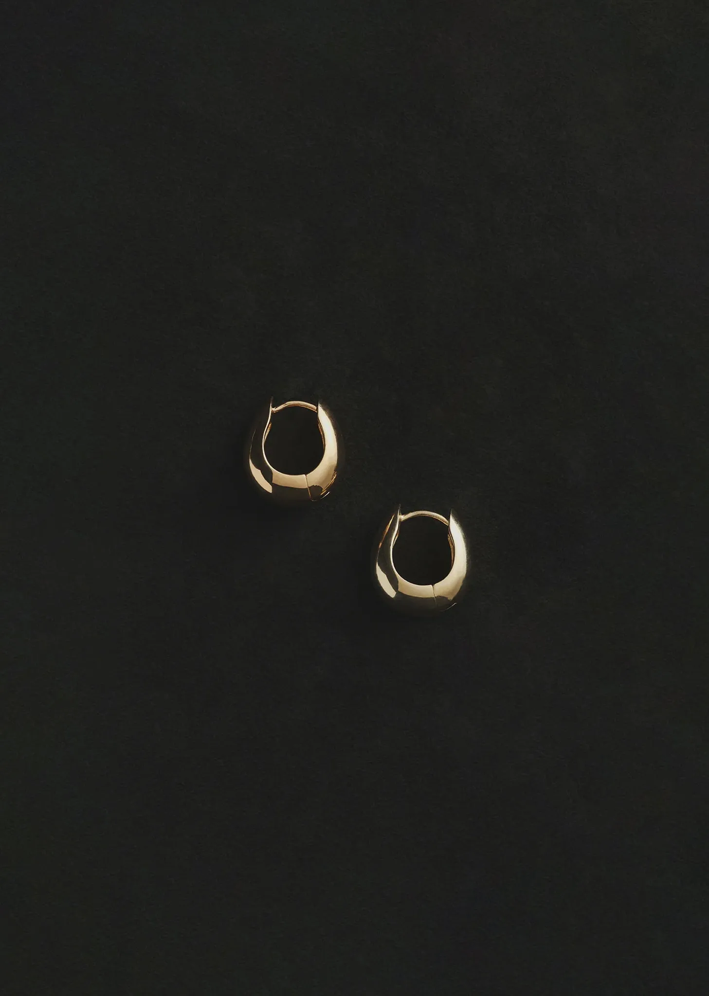 Gold Hinged Hoops sold by La Garconne