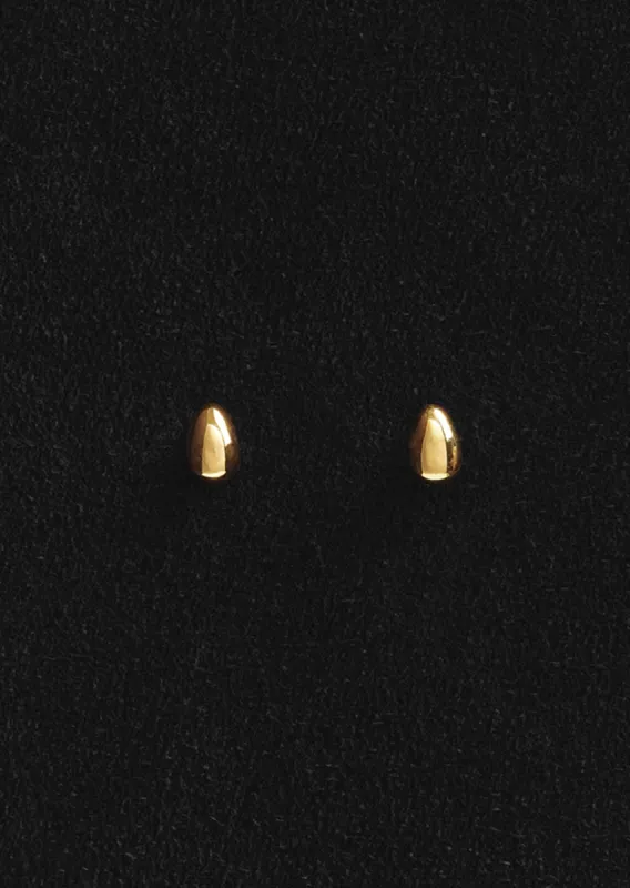 Gold Tiny Egg Studs sold by La Garconne