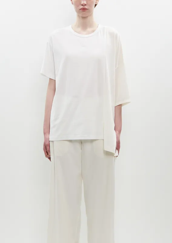 Stretch Jersey Asymmetrical Drop Top sold by La Garconne