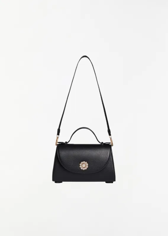 Grained Leather Pochette Valentine Bag sold by La Garconne