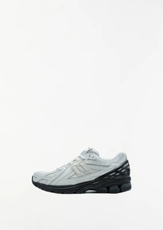 New Balance 1906 — White/Black sold by La Garconne