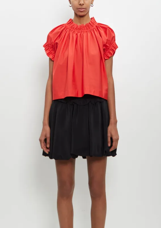 Cotton Ruffle Tulip Top — Red sold by La Garconne