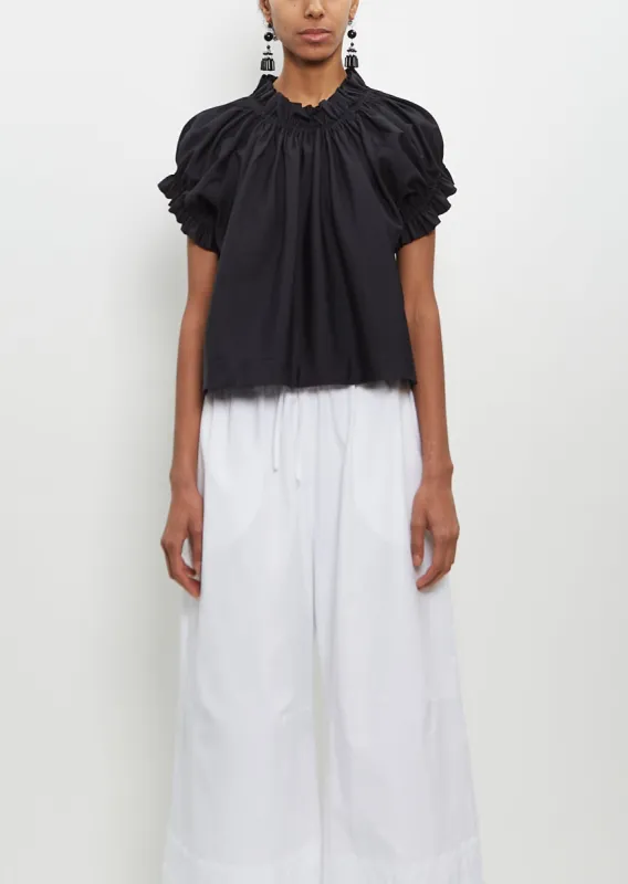 Cotton Ruffle Tulip Top — Black sold by La Garconne