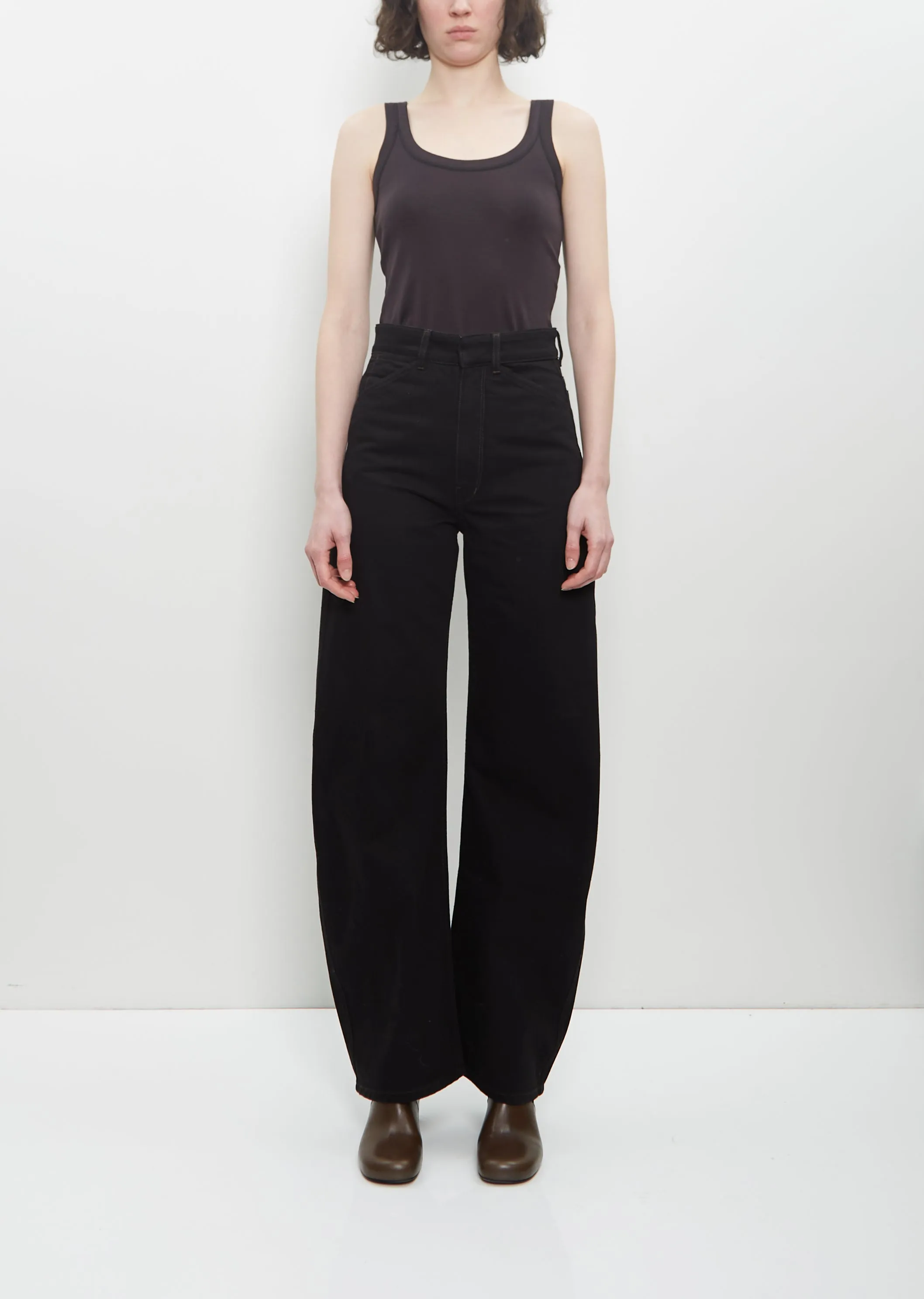 Denim High Waisted Curved Pants — Black sold by La Garconne