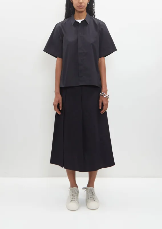 Cotton Sisli Pleated Skirt — Midnight sold by La Garconne