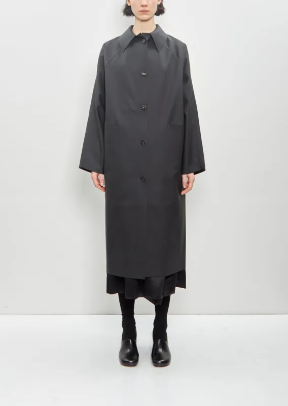 Rubber Original Below Coat — Black sold by La Garconne