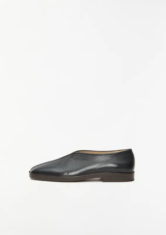 Flat Piped Slippers — Black sold by La Garconne