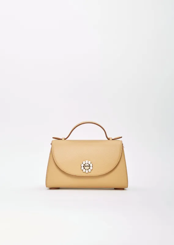 Leather Pochette Valentine Bag sold by La Garconne