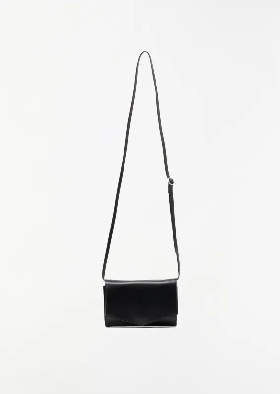 Metal Clasp Clutch Bag sold by La Garconne