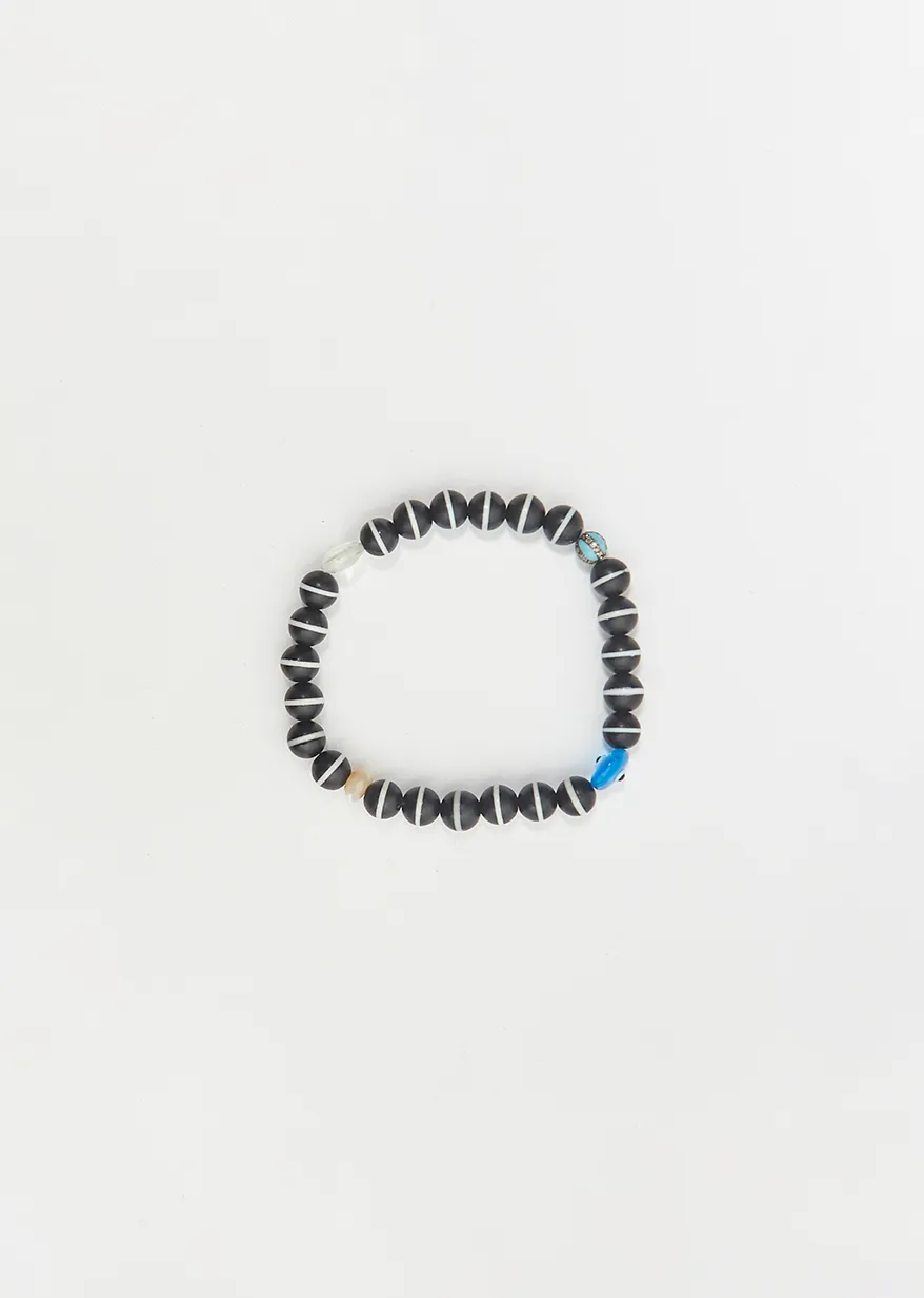 Black Onyx Stripe Beaded Bracelet 128 sold by La Garconne